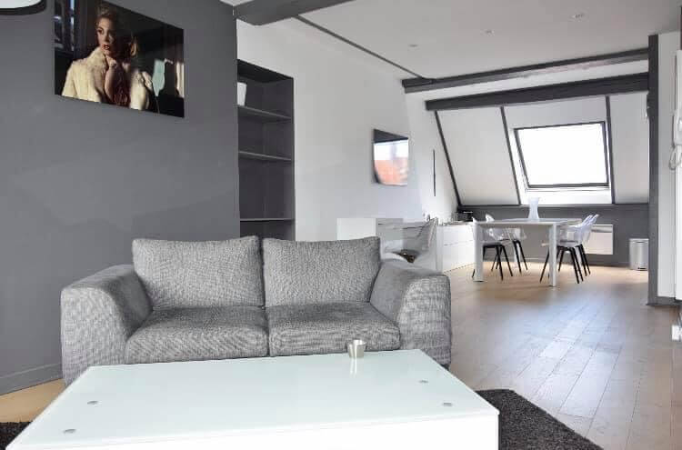 Image du salon d'un Appartement à vendre Vieux Lille par agence immobilière Lille